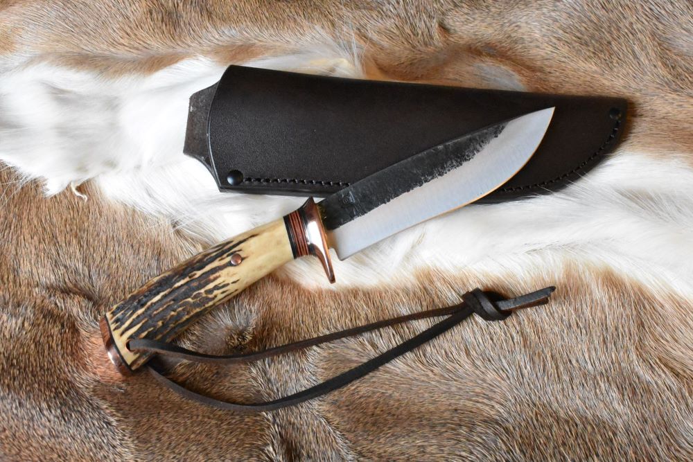 Behring Made Recurve Drop Point.JPG